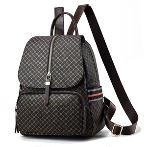 Women's large brown backpack with geometric diamond pattern and top handle for travel