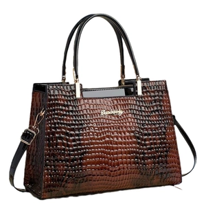 Vintage brown crocodile embossed leather tote bag with glossy handles and gold logo