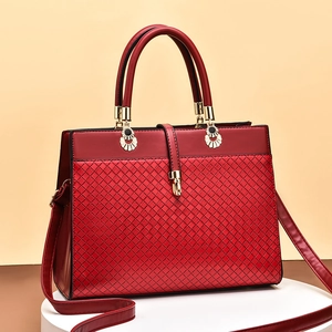 Deep red tote bag with rhombus texture, gold hardware and detachable shoulder strap