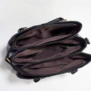 Three-layer black lychee leather handbag with large capacity and zipped interior compartments