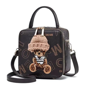 Brown leather crossbody box bag with letter print and 3D bear embroidery detail