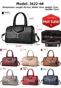 Detailed size specifications and interior compartments of the crocodile pattern handbag