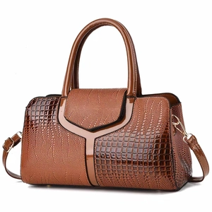 Brown crocodile embossed tote bag for women with polished patent leather and gold hardware