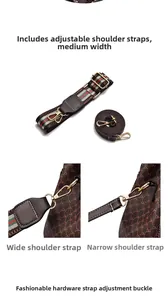 Detail of adjustable wide fabric strap and narrow leather strap with gold hooks for handbags