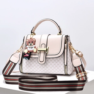 Pink crossbody square bag with DH monogram, golden handle and striped web shoulder strap