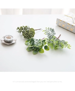 Detailed view of artificial pine needles and eucalyptus leaves for Christmas DIY decor