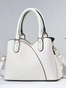 Large capacity white pebbled leather handbag with black contrast trim and gold hardware