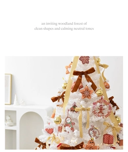 Detail of luxury white Christmas tree with vintage brown bows and gold ornaments