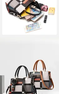 Detail view of large capacity plaid tote bag showing interior storage for tablet and phone