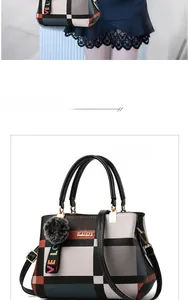 Detail of checkered leather handbag with plush ball charm and metal KUOY logo plate