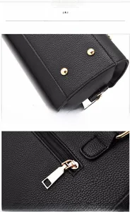 Detail of lychee pattern leather bag with golden anti-wear rivets and metal zipper