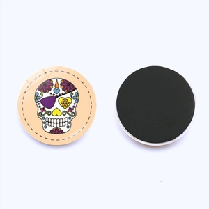 25mm Day of the Dead glass fridge magnet with colorful skull floral design and magnetic back
