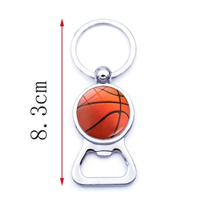 Detail view of a basketball bottle opener keychain featuring a dimensions guide showing 8.3cm