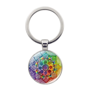 Silver mandala keychain with colorful geometric patterns and clear glass dome surface