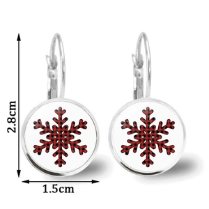 Close-up of snowflake earrings with red plaid pattern measuring 2.8cm in height