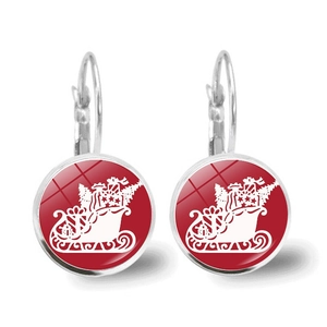 Close-up of lever-back Christmas earrings with red round base and white sleigh design