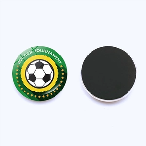 Detail of a 25mm soccer tournament glass fridge magnet with magnetic black back