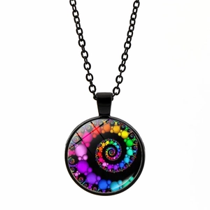 Macro shot of colorful spiral mandala glass pendant on a black alloy chain necklace