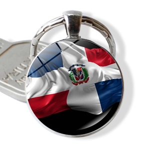 Round Dominican Republic flag keychain with a glass cabochon pendant and metal ring