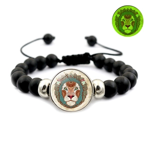 Luminous Leo zodiac beaded bracelet with matte black beads and adjustable woven cord