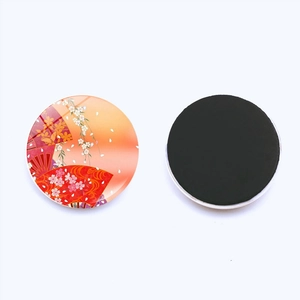 Japanese art fridge magnet with red fan and cherry blossoms on round crystal glass