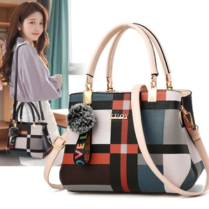 Stylish plaid patchwork handbag with high capacity and gray pom-pom charm for women
