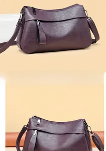 Nahaufnahme der eleganten lila Handtasche aus Kunstleder mit hochwertiger Kieselstruktur
