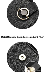 Details des goldenen Magnetverschlusses an der schwarzen Lederhandtasche mit Struktur