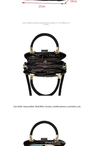 Details der schwarzen Handtasche mit Lederprägung, Innenfächern und großem Fassungsvermögen