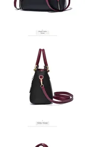 Side view of elegant black and burgundy crossbody bag with lychee texture and gold zippers