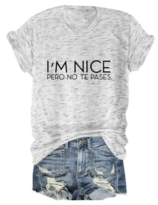 Detail of grey graphic t-shirt with text and distressed blue denim shorts set