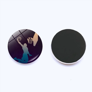 Round basketball slam dunk glass fridge magnet with magnetic back and purple starry athlete silhouette