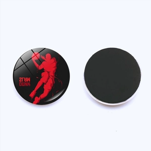 Round Slam Dunk glass fridge magnet featuring a red basketball player silhouette and black base