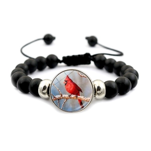 Beaded cardinal bird bracelet with black matte stones and adjustable woven cord strap
