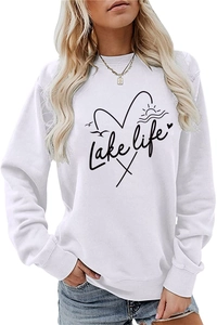 Close-up of Lake Life graphic print on a white crewneck sweatshirt with soft fleece texture
