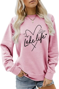 Close-up of pink Lake Life sweatshirt with ribbed cuffs and high-quality cotton texture