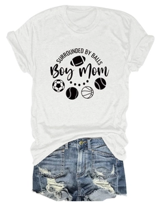 Flat lay of women's white Boy Mom T-shirt and distressed blue denim shorts combo