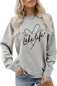 Close-up of Lake Life graphic print on a grey long sleeve crewneck sweatshirt texture