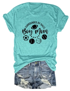 Flat lay of turquoise cotton T-shirt with sports graphics and distressed denim shorts