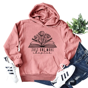 Pink hoodie with 'Just One More Chapter' book and floral graphic print, casual style