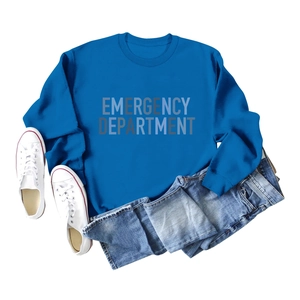 Flat lay of royal blue crewneck sweatshirt with emergency department print and denim shorts