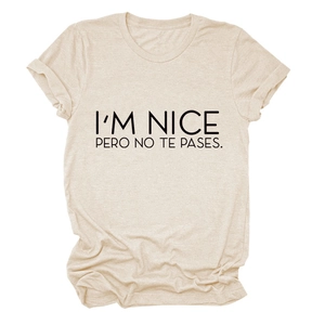 Close-up of I'M NICE letter print on apricot crew neck short sleeve cotton T-shirt