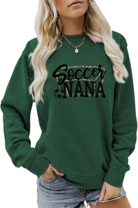 Detail of Soccer NANA graphic print on a dark green crewneck sweatshirt fabric