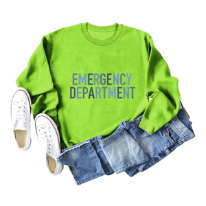 Flat lay of bright green sweatshirt with Emergency Department print and blue jeans