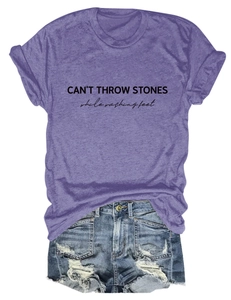 Detail of CAN'T THROW STONES letter print on purple crew neck short sleeve tee
