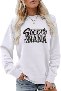 Detail of white long sleeve sweatshirt with Soccer NANA leopard print and soccer ball graphics