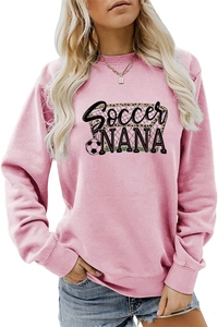 Detail of pink Soccer NANA crewneck sweatshirt featuring soccer ball and goal graphic print