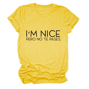 Flat lay of bright yellow cotton t-shirt featuring bold black slogan text print detail
