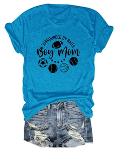 Detail of blue T-shirt featuring 'Surrounded by Balls' text and sports icons print