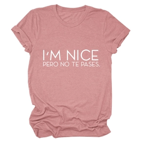 Detailed view of white letter print on a dusty rose cotton short sleeve t-shirt